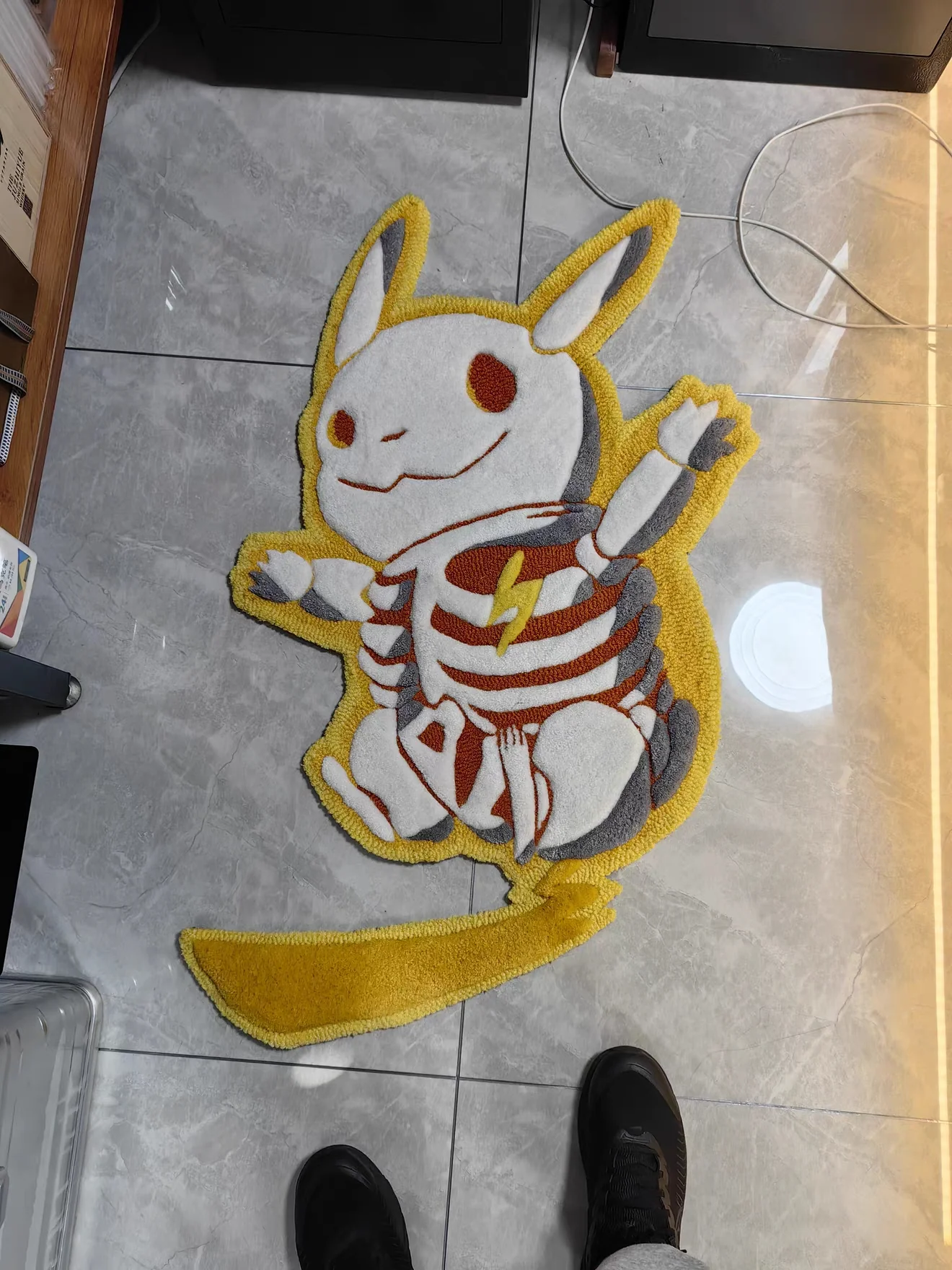 Yellow skeleton character rug in Liam's room